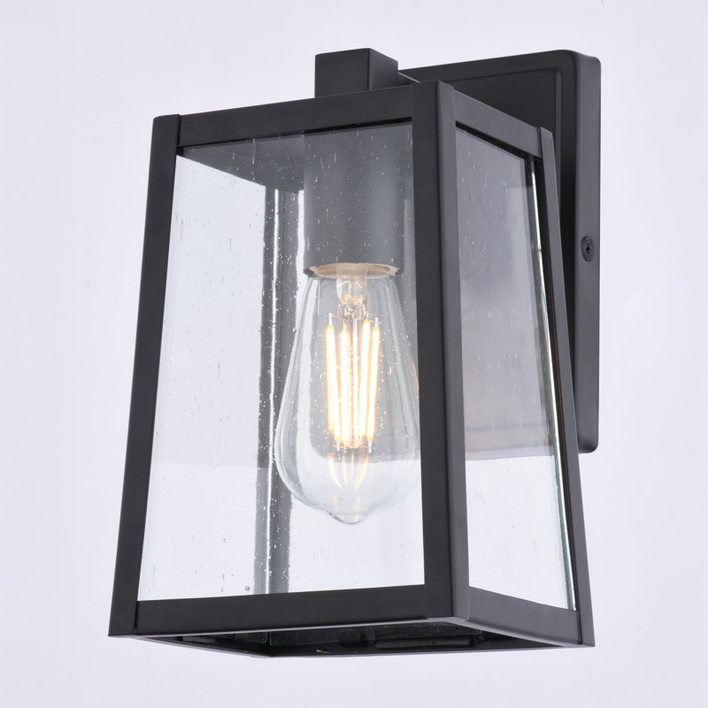  Sutton 9.5 in. H 1-Light Matte Black Contemporary Outdoor Wall Sconce made of Durable Steel, Clear Seeded Glass, LED Compatible, Use for Exterior Porch Patio Front Door or Garage