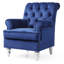 Fauteuil invitant en velours bleu traditionnel pour une expérience de lecture confortable