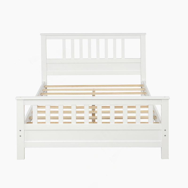 Lit plateforme en bois avec tête et pied de lit