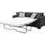 Canapé d'angle convertible gris foncé avec accoudoirs arrondis, siège à ressorts ensachés et quatre coussins décoratifs contemporains - Configuration