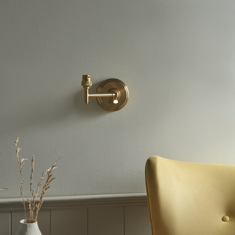 Step Fold Wall Fitting finished in Br Aged Brass