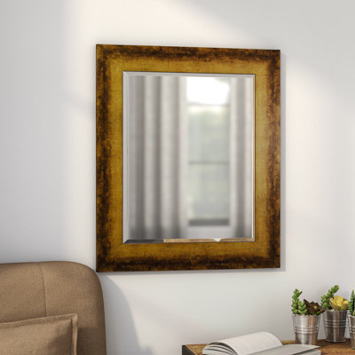 Miroir mural en bronze terni