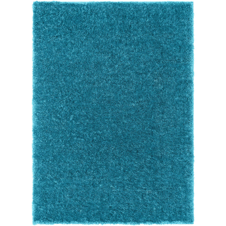Tapis bleu à poils longs Feather