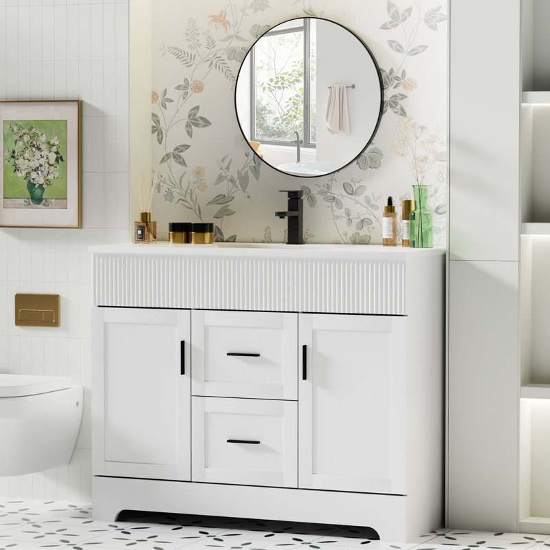Meuble-lavabo autoportant Breonica de 42 po avec lavabo intégré en résine, design cannelé moderne, fini laqué PU résistant à l'eau, portes et tiroirs à fermeture amortie pour la rénovation de votre salle de bain.