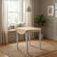 Deerfiled Extendable Round Solid Wood Dining Table