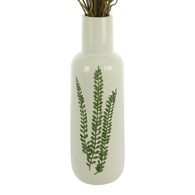 Organic Modern Smilax Arranged in a Ceramic Leaf Vase