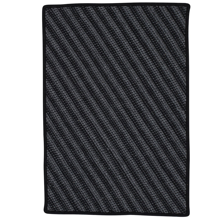 Tapis noir tressé à motif géométrique Ommegang