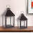 Set of Two Black Geometric Iron And Glass Floor Lantern Candle Holders