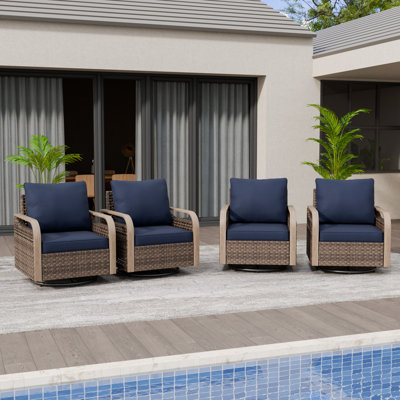 Chaise berçante d'extérieur en osier pivotant avec coussins