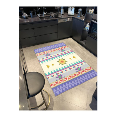 Tapis décoratif coloré à motif triangulaire et circulaire
