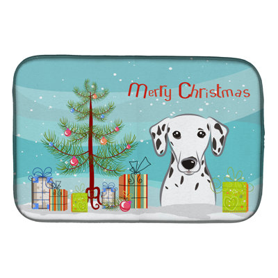 Tapis de séchage dalmatien et arbre de noël