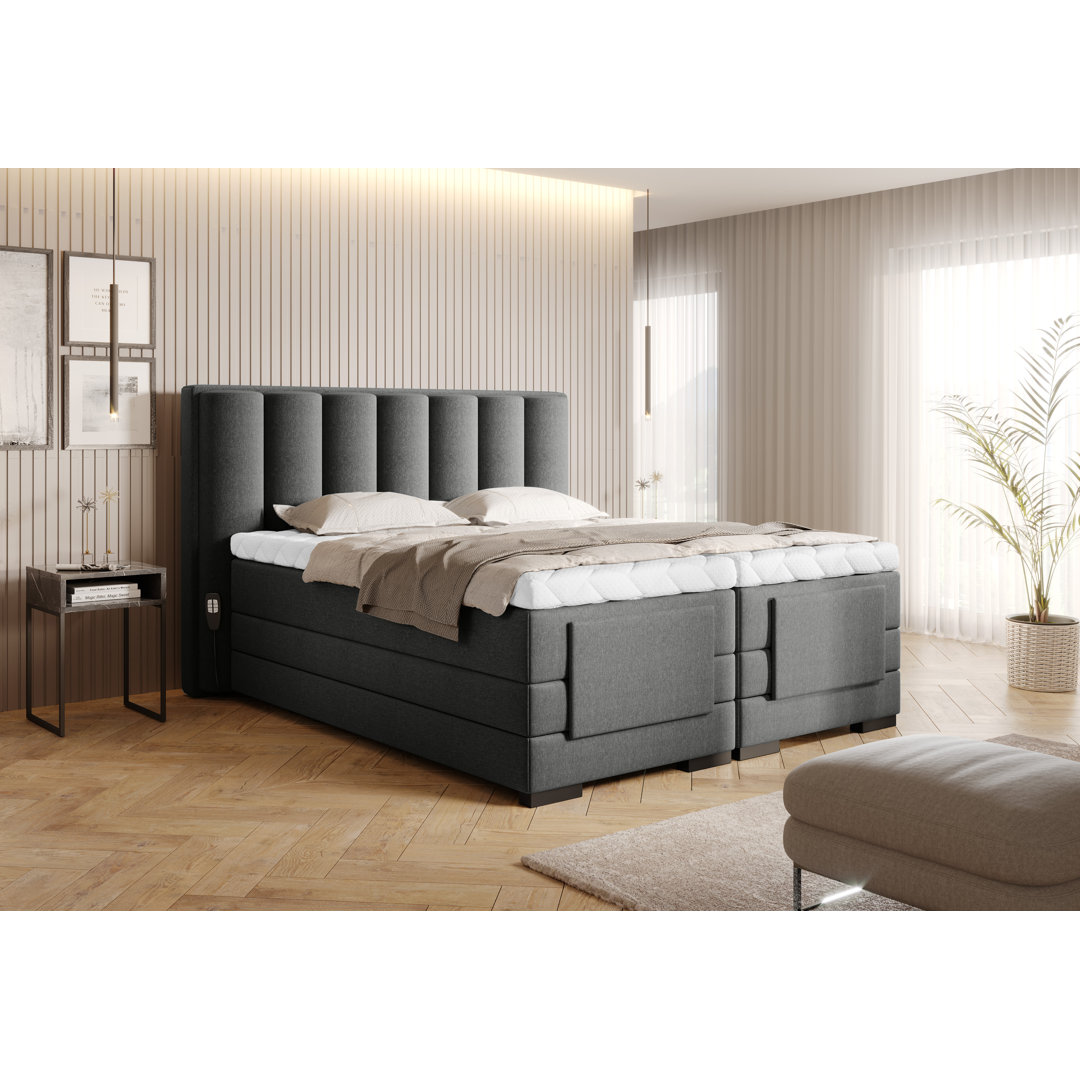 Elektrisch verstellbares Boxspringbett Arthurs mit Topper