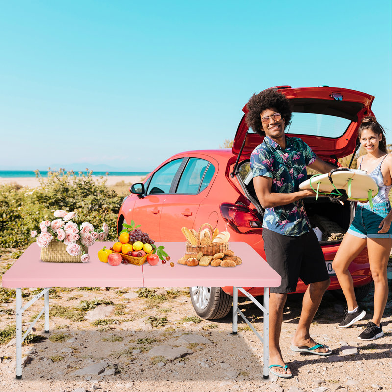 Pink Camping Folding Table 4Ft. Suitable For Indoor & Outdoor Fun. 135Kg Max Weight Load. Foldable With Fixed Grip Effortless Transport. Smooth And Waterproof Tabletop. Stable Triangular Design.