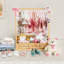 Porte-vêtements pour bébé avec boîte de rangement et tringle de suspension réglable pour poupée pour tout-petits 