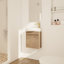 Meuble-lavabo compact de 16 po fixé au mur avec portes à fermeture douce et lavabo en céramique pour petites salles de bain