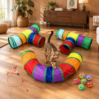 Grâce à ses fermetures éclair à jonction libre, ce grand ensemble de tunnels 3 en 1 à monter soi-même peut être configuré pour les chats d'intérieur, les chiots et les lapins, avec un tube de jeu pliable, une baguette à attraper et des trous d'observation inclus.