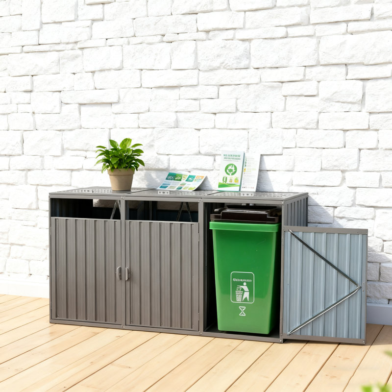 La poubelle en métal pour l'extérieur peut accueillir 3 poubelles avec ventilation, portes verrouillables et fabrication en acier galvanisé résistant aux intempéries.