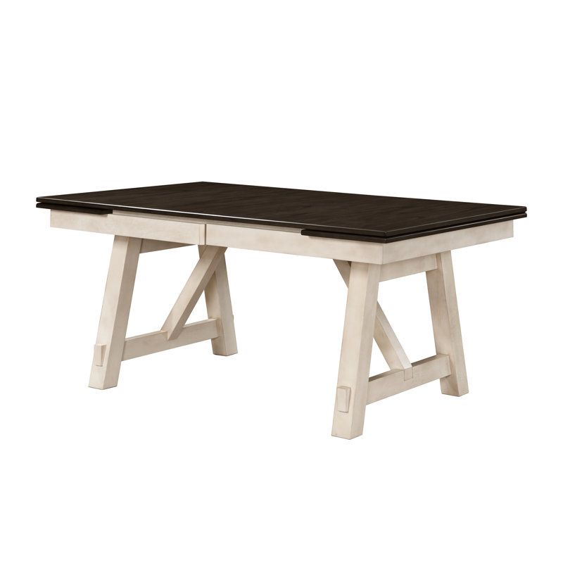 Table de salle à manger en bois de style maison de campagne avec une finition gris craie et des feuilles autoportantes transitionnelles avec des pieds en tréteaux robustes