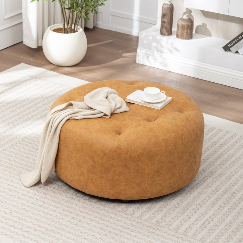 Castanedo Upholstered Round Ottoman, Polyester - Vintage Yellow