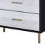 Commode noire, argentée et dorée