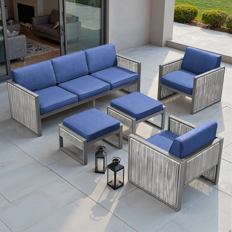 Trinie Outdoor 5-Piece PE Wicker Patio Set With Ottomans And Cushions, Blue