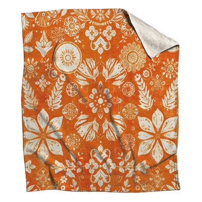 Couvertures à motif floral orange