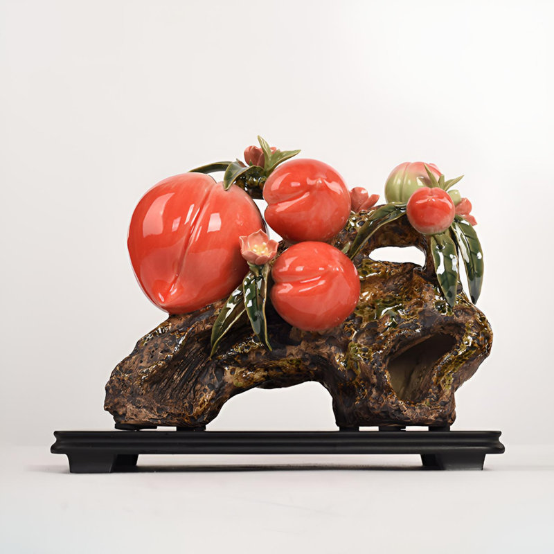 Œuvre en céramique délicate en forme de pêche pour le style intérieur
