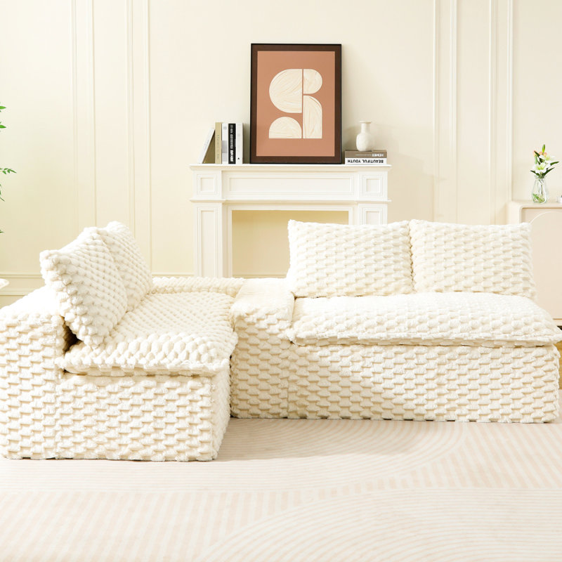Canapé quatre places en velours blanc tortue, multifonctionnel et modulable, confortable et luxueux, pouvant supporter jusqu'à 180 kg, idéal pour la décoration intérieure.