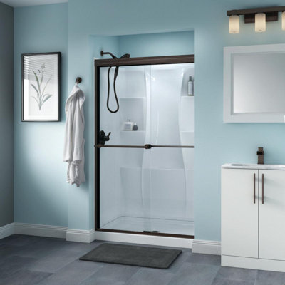 Porte de douche coulissante traditionnelle demi-cadre avec verre transparent Trinsic 48 po x 70 po