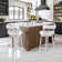 Deherrera Modern Swivel Counter or Bar Stool with Open Low Back and Footrest in Metal and Faux Leather