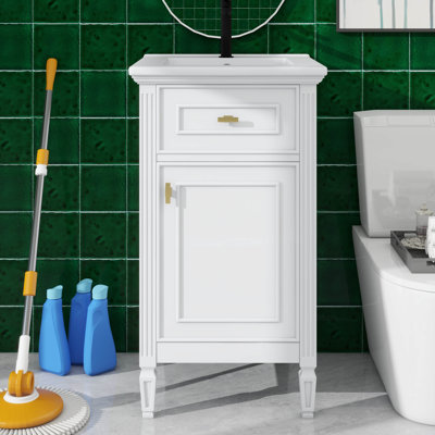 L'ensemble de meuble-lavabo de salle de bain élégant de 20 pouces est livré avec un tiroir inclinable, une tablette polyvalente et un support de rangement
