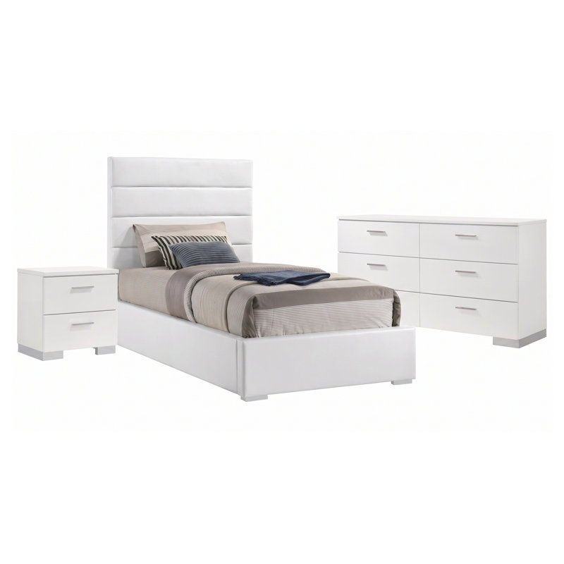 Ensemble de chambre à coucher Genevieve White pour lit simple, comprenant un lit rembourré, une commode et une table de chevet.