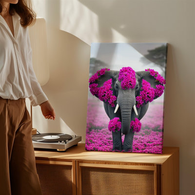 Toile, un majestueux éléphant se tient en évidence dans un champ vibrant débordant d'art avec des fleurs roses vives créant un art mural sur toile frappant