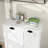 Laundry Sorter Cabinet In White. Elegant And Functional. Removable Cloth Storage Bags. E1 , . Waterproof & Safe. . Easy To Assemble. 100-pound Load Bearing White Cabinet. Bags For Convenience.