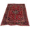 Nanka Wool Oriental Area Rug in Red