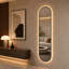 Miroir mural pleine longueur à DEL dimmable en forme de capsule avec cadre