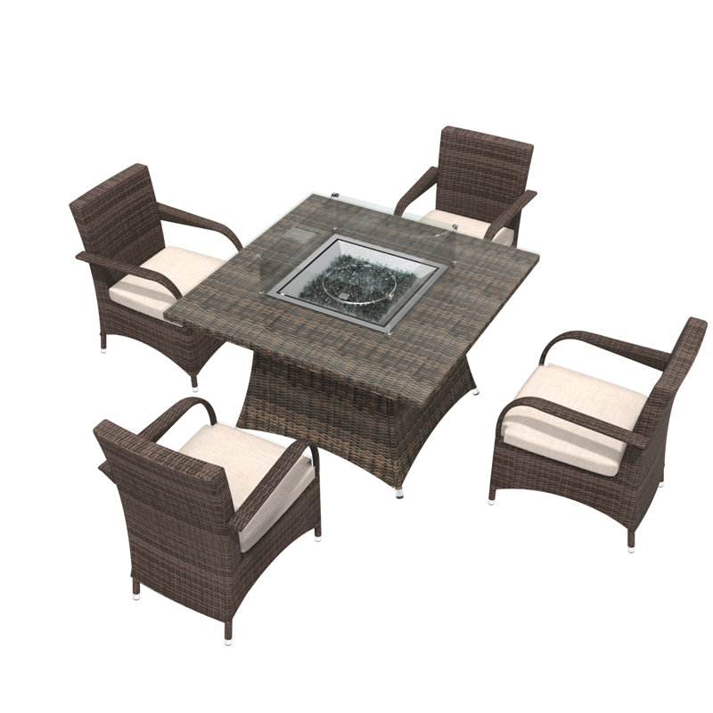 Schwerin Wicker 4 - Person Patio Conversation Set with Cushions