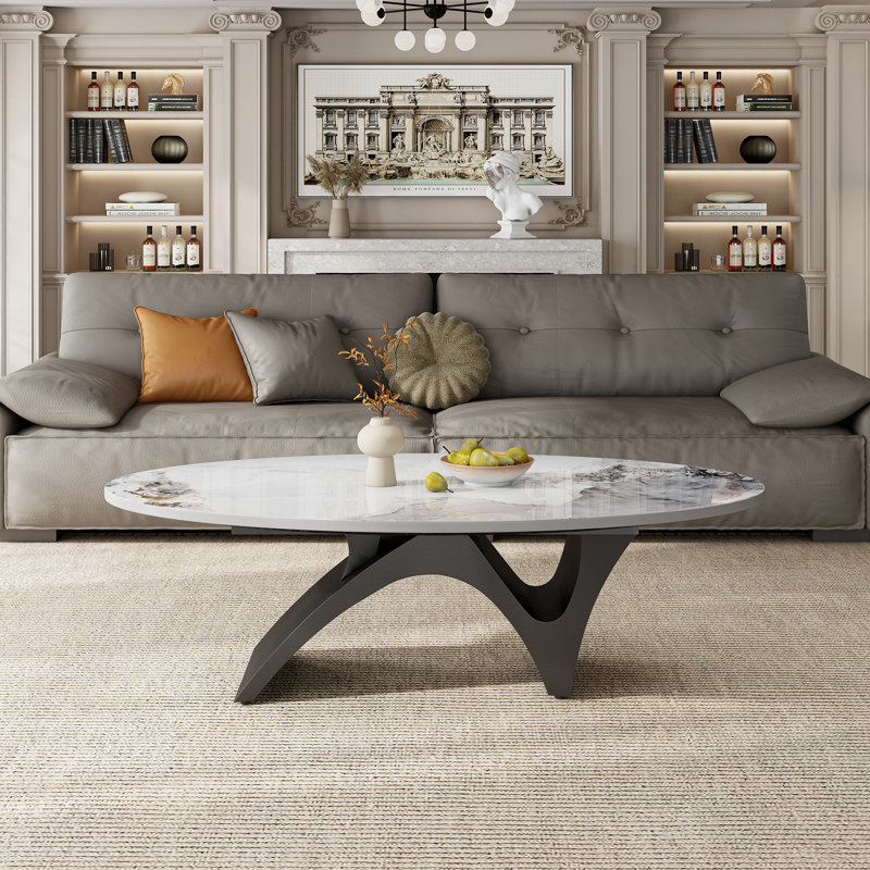 Table basse ovale moderne de 125 cm (49,2 po), plateau en pierre frittée imitation marbre, piètement minimaliste en métal sculptural, montage facile