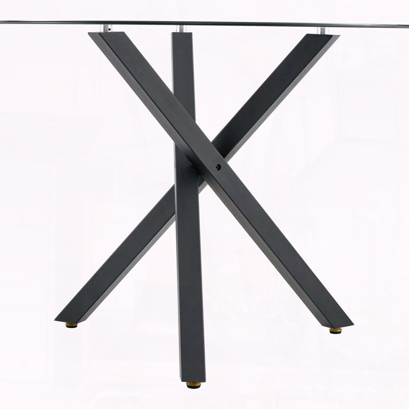Table de salle à manger ronde en verre avec structure en métal en forme de X