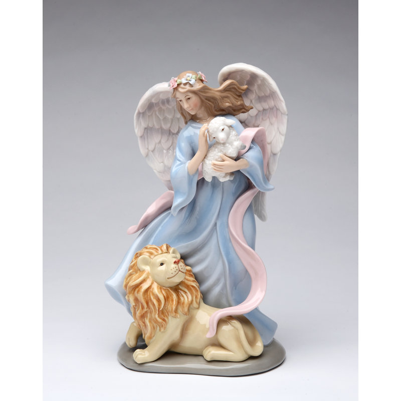 Figurine musicale ange avec lion et agneau