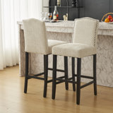 Tabouret de bar rembourré Baltimore avec structure en bois massif