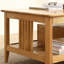 Table basse à quatre pieds en bois massif avec rangement