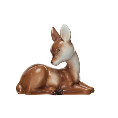 Céramique décorative fauve couchée