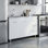Armoire de base avec évier supérieur en acier inoxydable, trois tiroirs et deux portes pour le rangement intérieur Ferretti