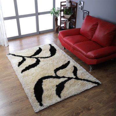 Tapis rectangulaires en polyester à poils longs touffetés à la main Crayton