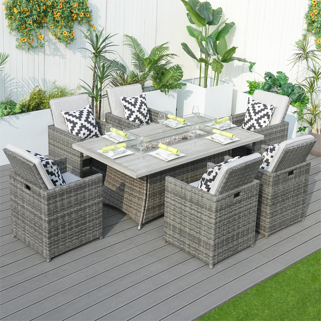 Takuya 6 - Person Wicker Patio Dining Set with Rectangular Table , Cushions Included Ebern Designs Frame 