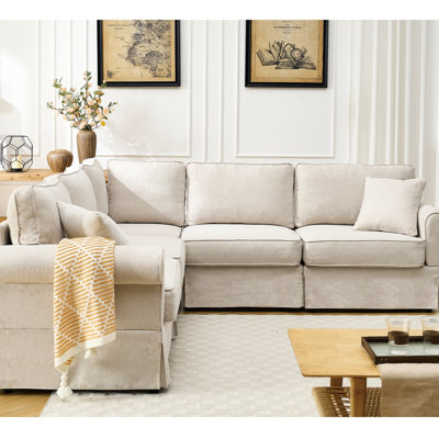 Canapé modulaire à 5 places en L beige avec revêtement en tissu doux et base en lin beige