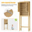 Armoire de rangement en rotin au-dessus de la toilette