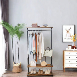 Industrial Clothing Rack - A Pipe Style Rolling Garment Rack With A Heavy-Duty Steampunk Design. This Hall Tree On Wheels Features Rustic Wood And Comes With A Shelf And Shoes Storage, Perfect For Home Or Retail Store Use.