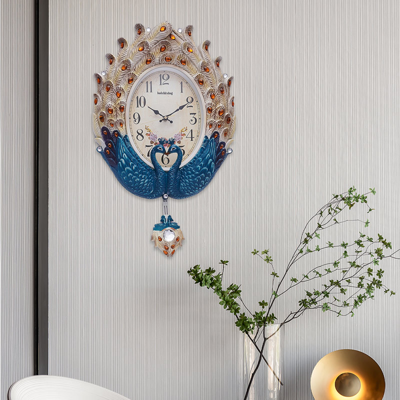 Horloge murale créative en forme de paon
